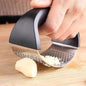 Handheld garlic smasher